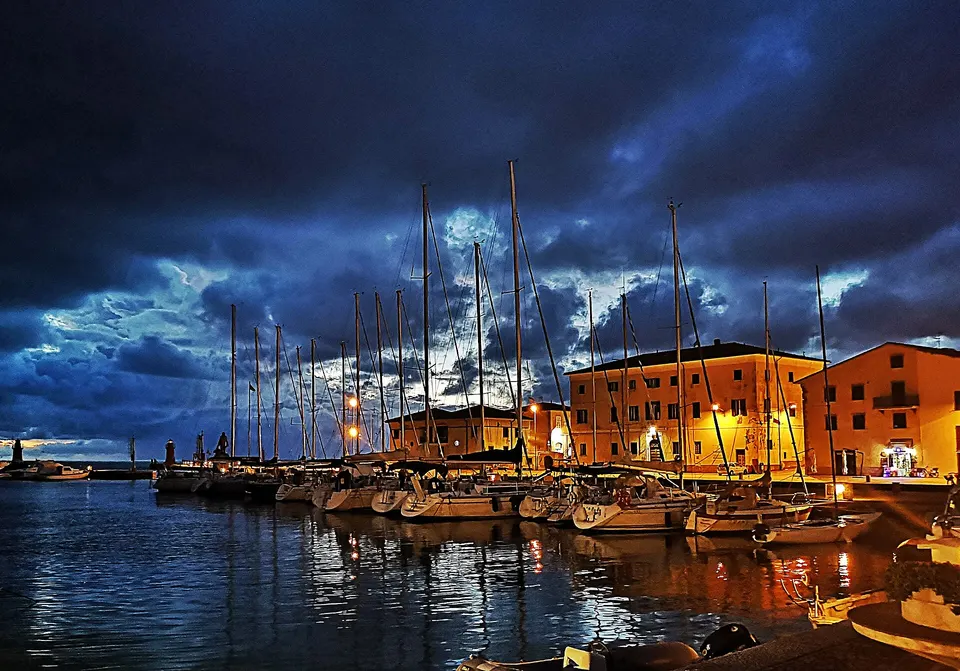 Night view of darsena, Castiglione della Pescaia, Tuscany, Italy.